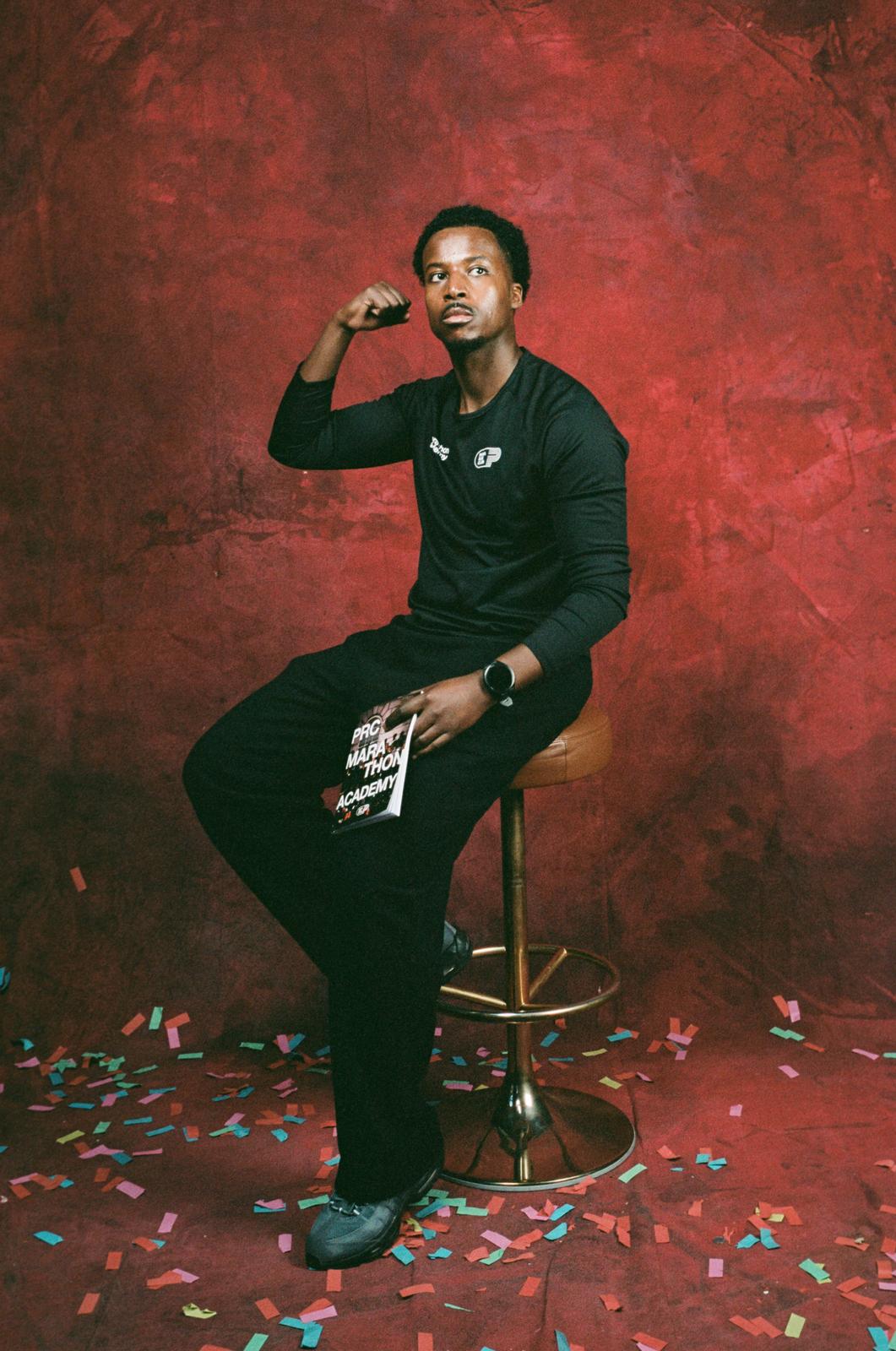 Scenic painter working on a custom backdrop